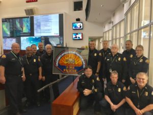 Fire Staff with the lego replica of their badge