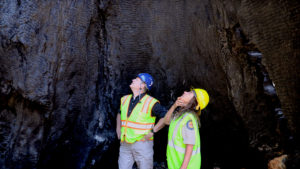 Shawn Boyd and Environmental Scientist Joanne Kerbavaz Examine Interior of Scorched Auto Tree in Big Basin