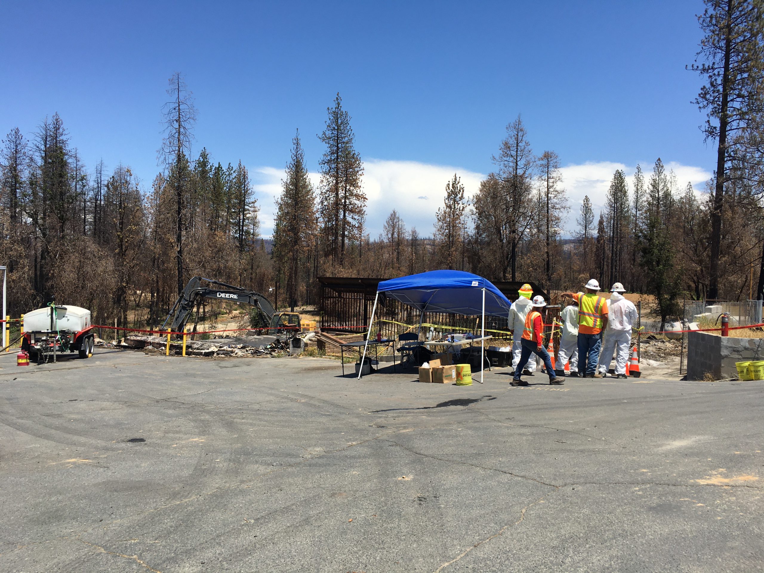 Debris removal team looks at site of structure fire