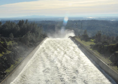 Raging water flows out of the Oroville Dam spillway prior to closure