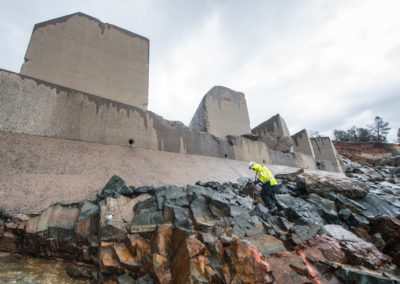 California Department of Water Resources geologist John Curless explores the area beneath the Oroville Dam spillway dissipator blocks, March 4, 2017.
