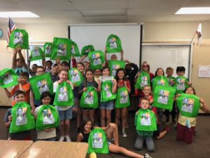 photo of Ms. Wendy Grider’s 4th Grade Class holding their preparedness bags