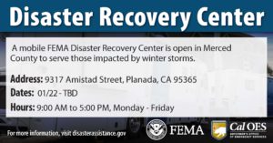 "Disaster Recovery Center" with the address and hours listed in the foreground and an image of FEMA trailers in the background.