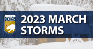 Snow covered cabin background. Cal OES logo. Text: 2023 March Storms