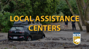 A graphic reading, Local Assistance Centers" and a Cal O E S logo in the bottom right hand corner. A image of flooded vehicles behind the text and logo.