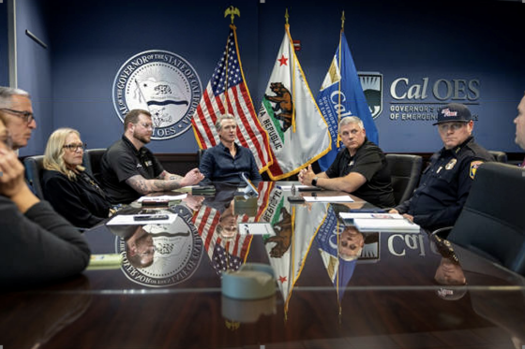Governor Gavin Newsom at table with Cal OES leadership